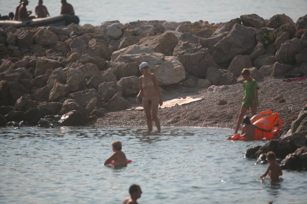 FKK cove pyramid in waters - Nudism is based on naturalness and openness