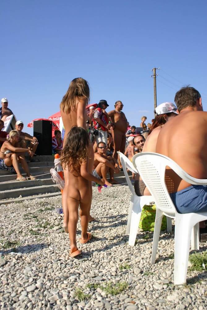 Naturist Standing Sideline - Nature provides inspiration and energy for the lives of naturists