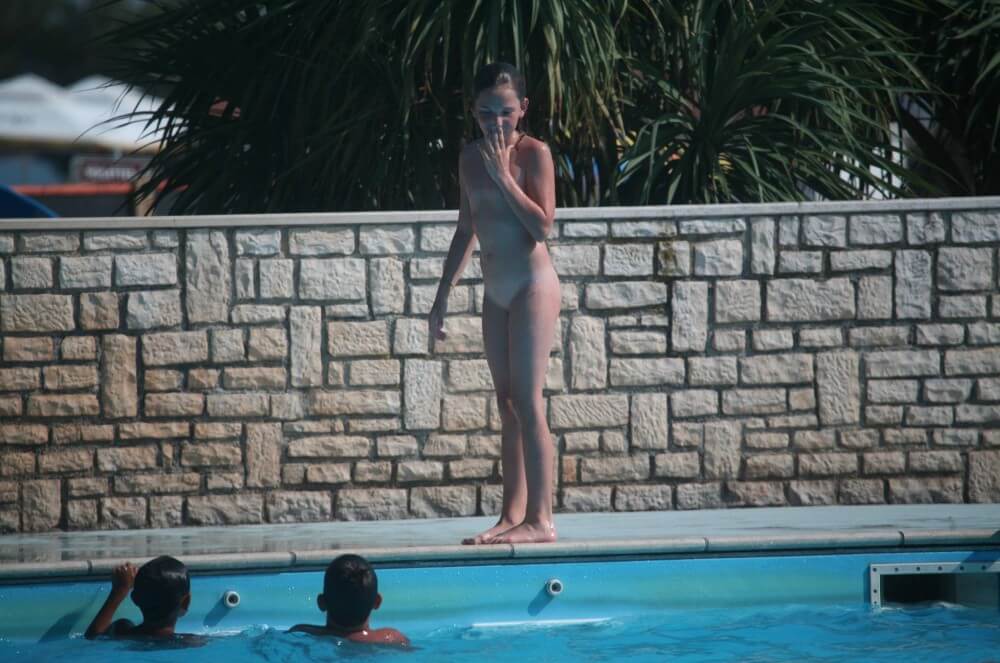 Naturist Pool-Side Singles photos - Naturists view nudity as a philosophy of life