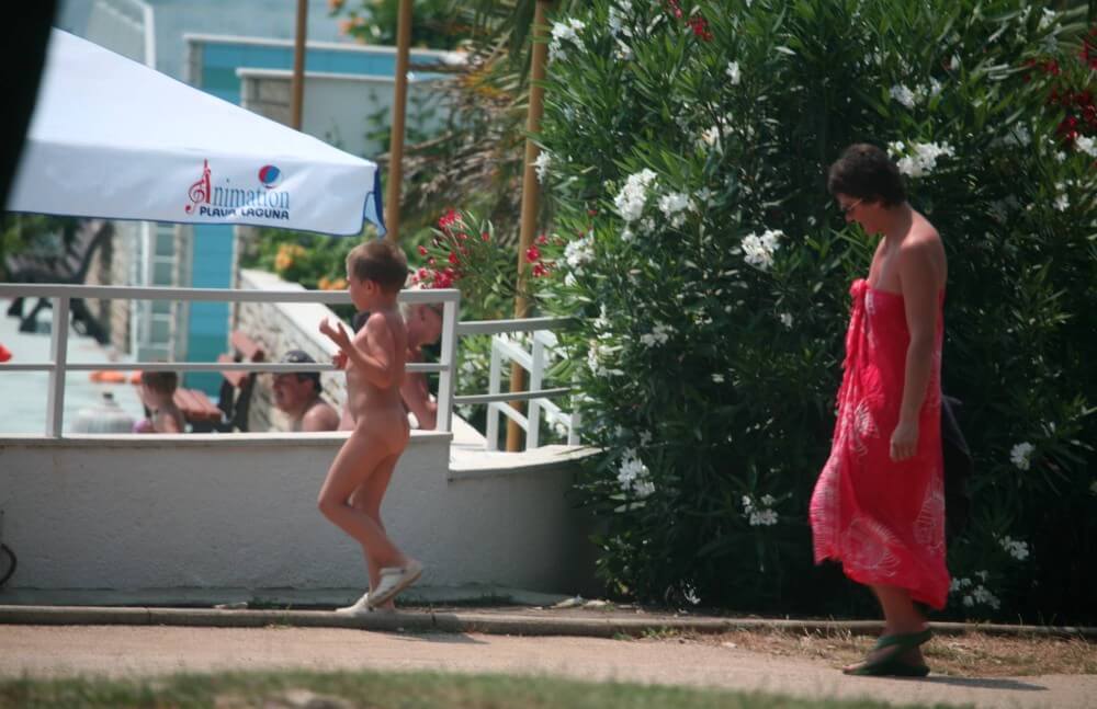 Naturist Pool Walkaround pics - Naturism implies a life free of unnecessary problems