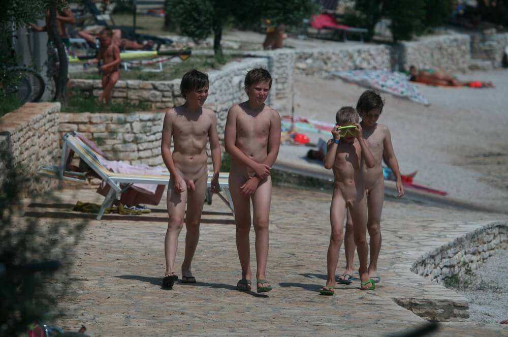 Shore walking nude - Nudism is often equated with naturism