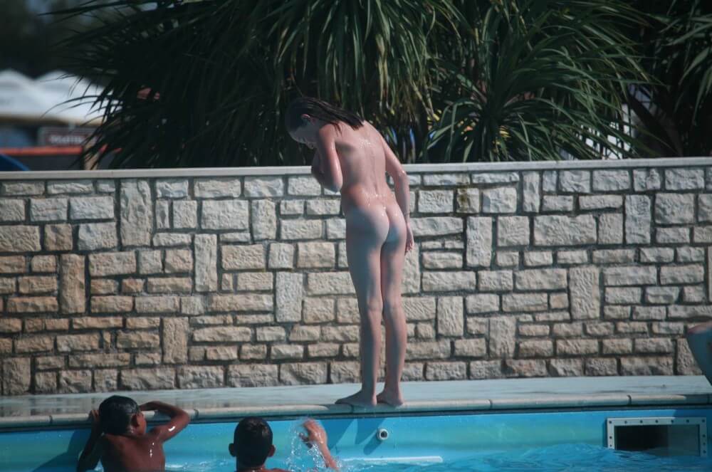 Naturist Pool-Side Singles pics - A nudist values inner balance and peace of mind