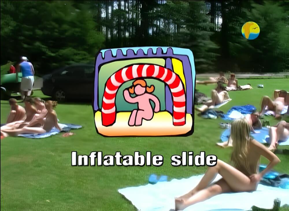 Naturist: Freedom: Inflatable Slide - Nudity is a part of life without shame or fear