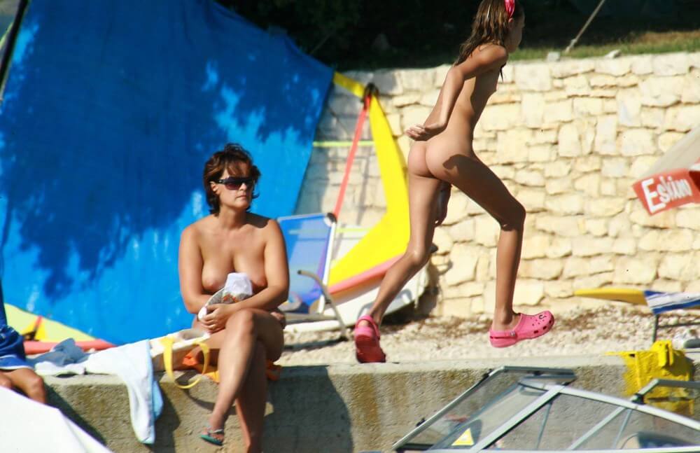 Bright Day Sun Tanning pics - Naturism teaches us to accept ourselves and others without embarrassment