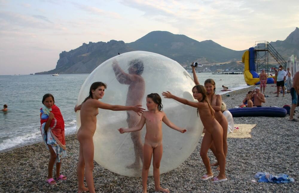 Pics Walk on the Beach Balloon - Overcoming inhibitions is one of the goals of nudism
